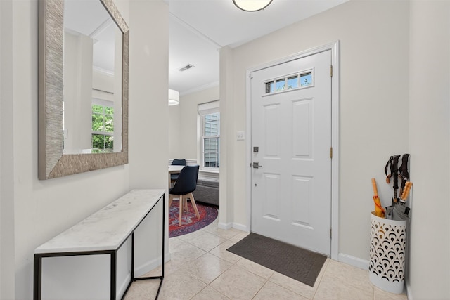 42 Prestwick Ct, Poughkeepsie, NY 12603 - foyer with light tile patterned flooring and ornamental molding