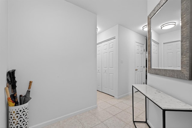 42 Prestwick Ct, Poughkeepsie, NY 12603 - hallway featuring light tile patterned floors and baseboards