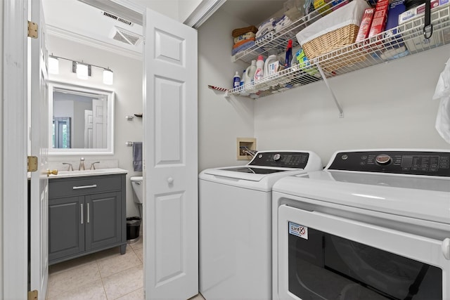 42 Prestwick Ct, Poughkeepsie, NY 12603 - washroom with separate washer and dryer and light tile patterned floors