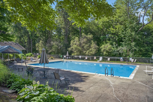 42 Prestwick Ct, Poughkeepsie, NY 12603 - community pool featuring a patio area