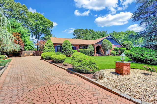 51 Glenridge Ave, Stony Brook, NY 11790 - view of front of home with a front lawn and brick siding