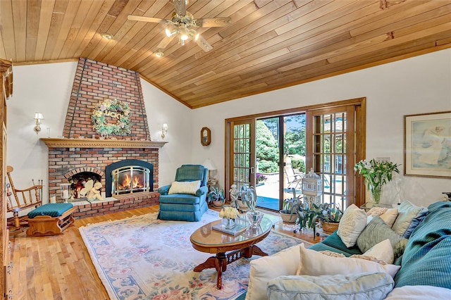 51 Glenridge Ave, Stony Brook, NY 11790 - living area with vaulted ceiling, wooden ceiling, ceiling fan, wood-type flooring, and a fireplace