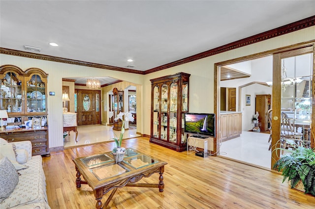 51 Glenridge Ave, Stony Brook, NY 11790 - living room with ornamental molding, a chandelier, hardwood / wood-style flooring, healthy amount of natural light, and recessed lighting