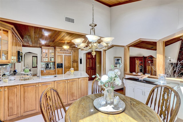 51 Glenridge Ave, Stony Brook, NY 11790 - dining room featuring wooden ceiling, a chandelier, and arched walkways