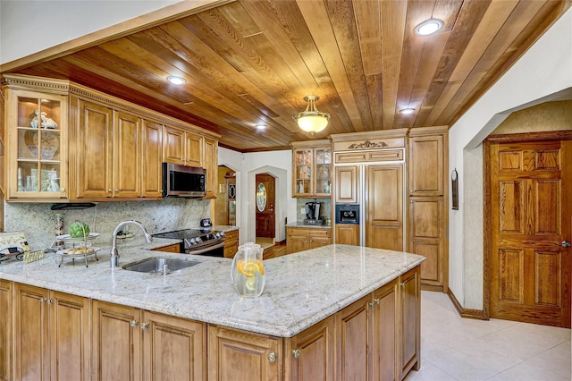 51 Glenridge Ave, Stony Brook, NY 11790 - kitchen with stainless steel appliances, a peninsula, wood ceiling, light stone counters, and backsplash