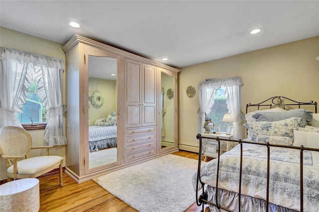 51 Glenridge Ave, Stony Brook, NY 11790 - bedroom with light wood-style floors and recessed lighting