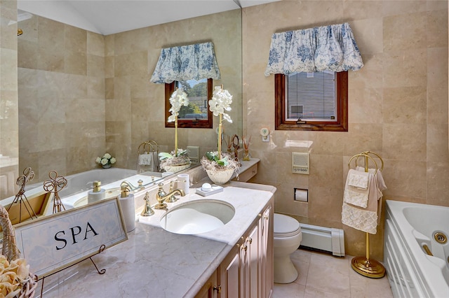 51 Glenridge Ave, Stony Brook, NY 11790 - bathroom featuring baseboard heating, tile walls, a jetted tub, vanity, and tile patterned flooring