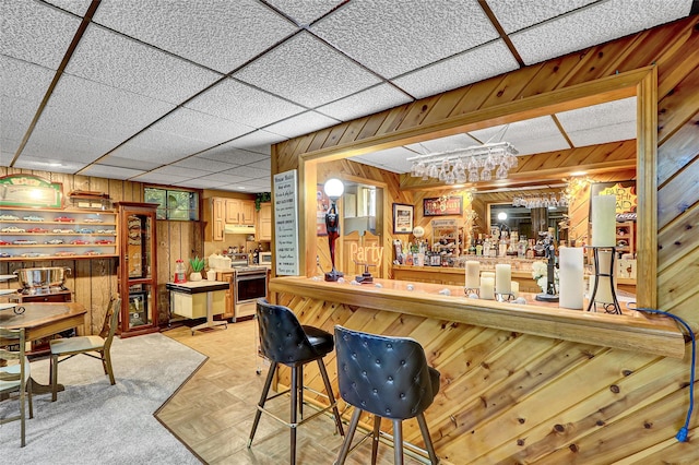 51 Glenridge Ave, Stony Brook, NY 11790 - indoor bar featuring wooden walls, white range with electric stovetop, and under cabinet range hood