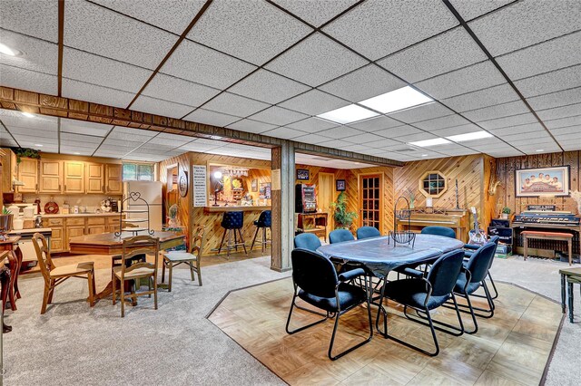 51 Glenridge Ave, Stony Brook, NY 11790 - dining area featuring wood walls and a drop ceiling