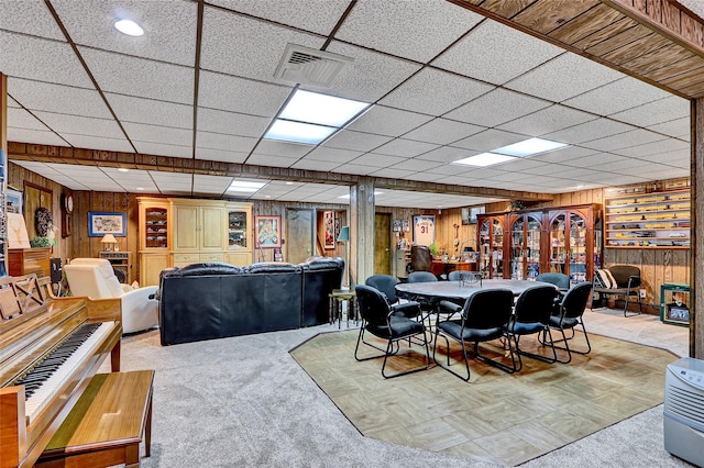 51 Glenridge Ave, Stony Brook, NY 11790 - carpeted dining space with wood walls and a drop ceiling