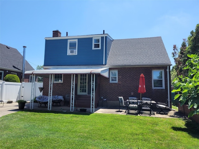 422 Saint Agnes Pl, Franklin Square, NY 11010 - rear view of property featuring a patio area, a chimney, and brick siding
