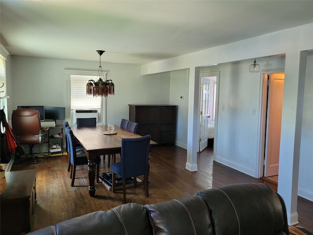 422 Saint Agnes Pl, Franklin Square, NY 11010 - dining space featuring a chandelier and dark wood-type flooring