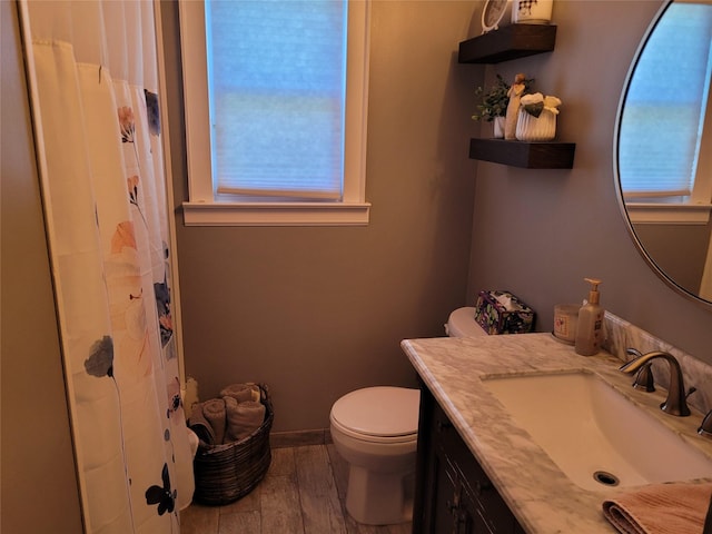 422 Saint Agnes Pl, Franklin Square, NY 11010 - bathroom with healthy amount of natural light, vanity, and curtained shower