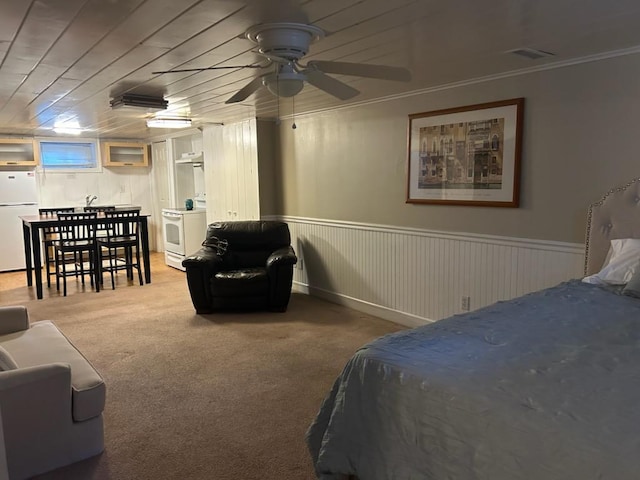 422 Saint Agnes Pl, Franklin Square, NY 11010 - carpeted bedroom with freestanding refrigerator and a wainscoted wall