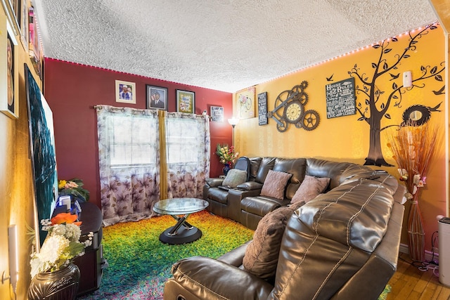 15 E Walnut St, Central Islip, NY 11722 - living room with a textured ceiling and wood finished floors