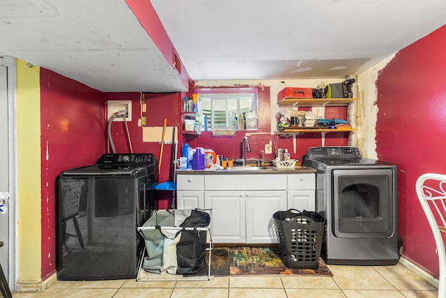 15 E Walnut St, Central Islip, NY 11722 - kitchen featuring washer and clothes dryer, open shelves, white cabinets, light tile patterned flooring, and dark countertops