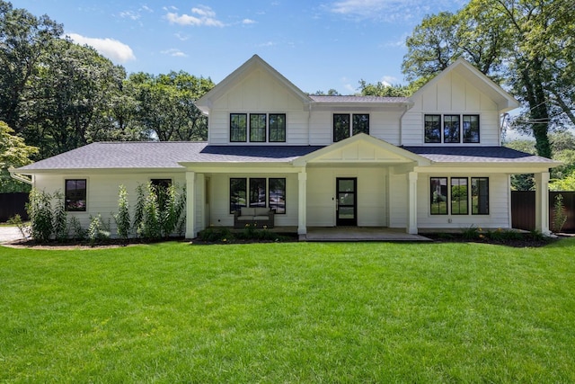9 Guthrie Ct, East Northport, NY 11731 - modern inspired farmhouse with board and batten siding, a shingled roof, and a porch
