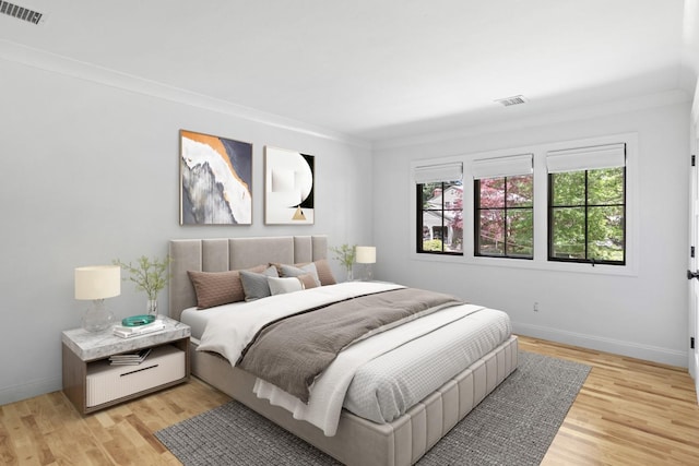 9 Guthrie Ct, East Northport, NY 11731 - bedroom with light wood finished floors