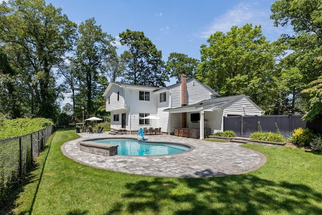 9 Guthrie Ct, East Northport, NY 11731 - rear view of property with a chimney, a patio, and a fenced backyard