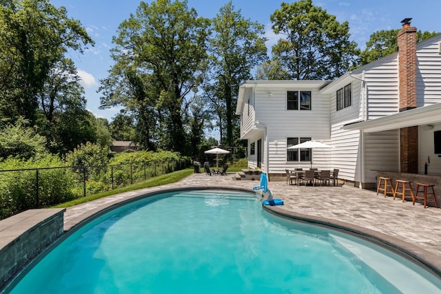 9 Guthrie Ct, East Northport, NY 11731 - view of swimming pool featuring a patio area