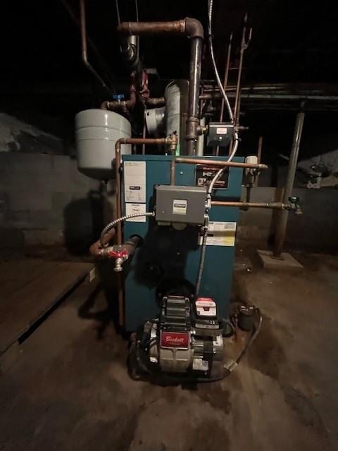 39 Winslow Pl, Liberty, NY 12754 - utility room with oil tank