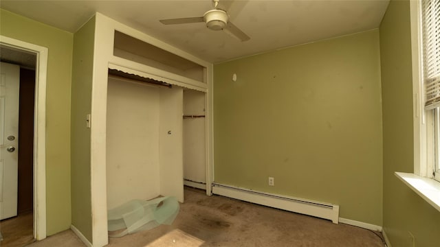 14 Lois Ln, Farmingdale, NY 11735 - unfurnished bedroom with baseboard heating, light carpet, a closet, and ceiling fan