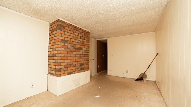14 Lois Ln, Farmingdale, NY 11735 - empty room featuring a textured ceiling and carpet floors