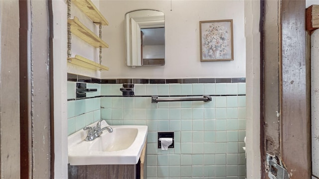 151-07 85th Ave, Briarwood, NY 11432 - half bathroom with vanity, tile walls, and wainscoting