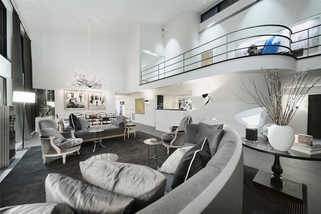 carpeted living area featuring a towering ceiling