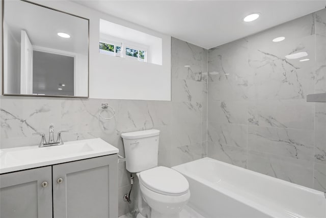 10 Branch Pl, Roosevelt, NY 11575 - bathroom with vanity, shower / washtub combination, tile walls, and recessed lighting