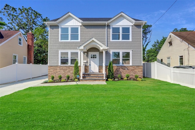 10 Branch Pl, Roosevelt, NY 11575 - view of front of home featuring stone siding