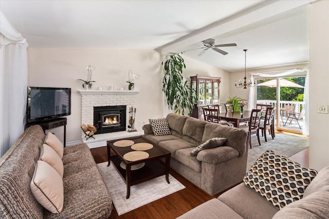 542 Peekskill Hollow Rd, Putnam Valley, NY 10579 - living room featuring wood finished floors, a ceiling fan, a fireplace, and a chandelier