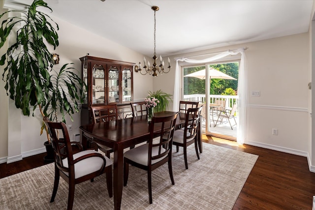 542 Peekskill Hollow Rd, Putnam Valley, NY 10579 - dining space with a chandelier, wood finished floors, and lofted ceiling