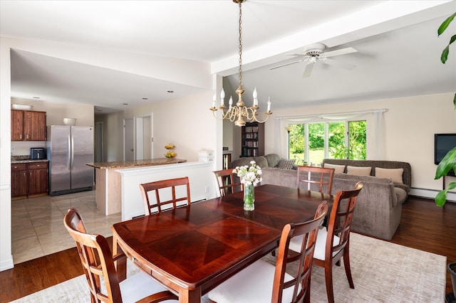 542 Peekskill Hollow Rd, Putnam Valley, NY 10579 - dining space with a chandelier, ceiling fan, and light wood-style floors