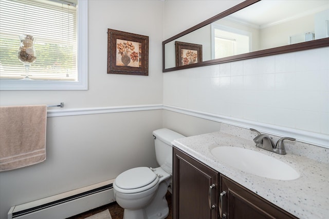 542 Peekskill Hollow Rd, Putnam Valley, NY 10579 - half bathroom with a baseboard radiator, vanity, and crown molding