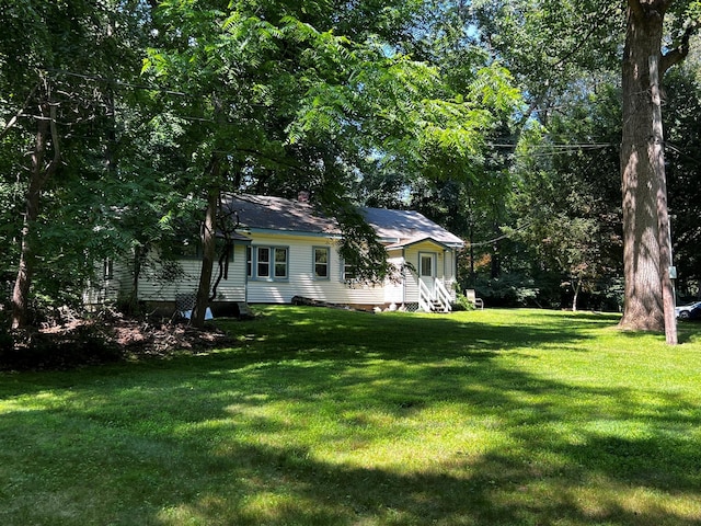 2 Briar Ln, Crompond, NY 10517 - view of green lawn with entry steps