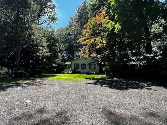 2 Briar Ln, Crompond, NY 10517 - view of front of house with a front yard and gravel driveway