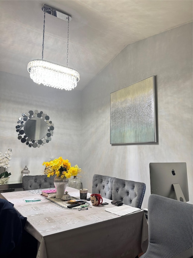 411 121st St Unit 12A, College Point, NY 11356 - dining area featuring a chandelier and lofted ceiling
