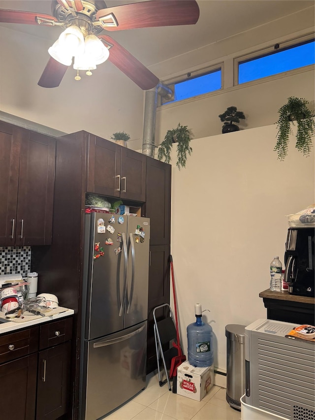 411 121st St Unit 12A, College Point, NY 11356 - kitchen with freestanding refrigerator, a ceiling fan, light tile patterned floors, light countertops, and dark brown cabinets