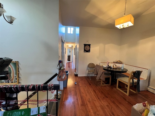 411 121st St Unit 12A, College Point, NY 11356 - hall with wood-type flooring and baseboards