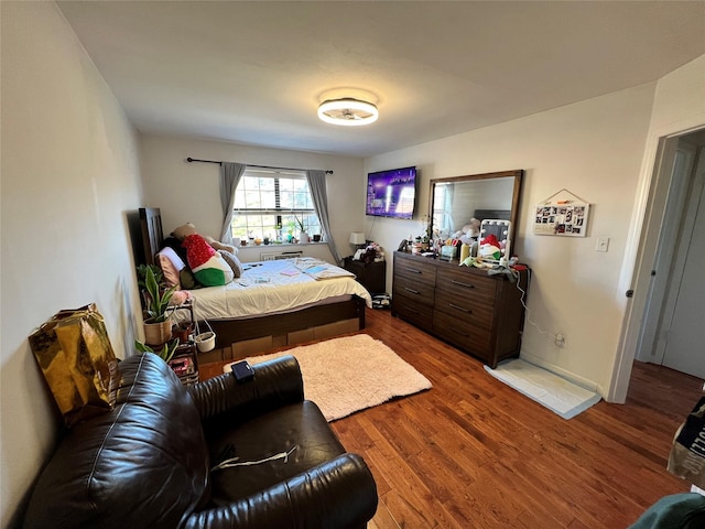 411 121st St Unit 12A, College Point, NY 11356 - bedroom with wood finished floors and baseboards