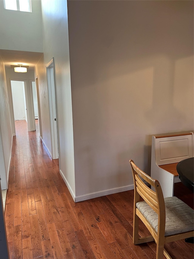 411 121st St Unit 12A, College Point, NY 11356 - corridor featuring hardwood / wood-style flooring and a high ceiling