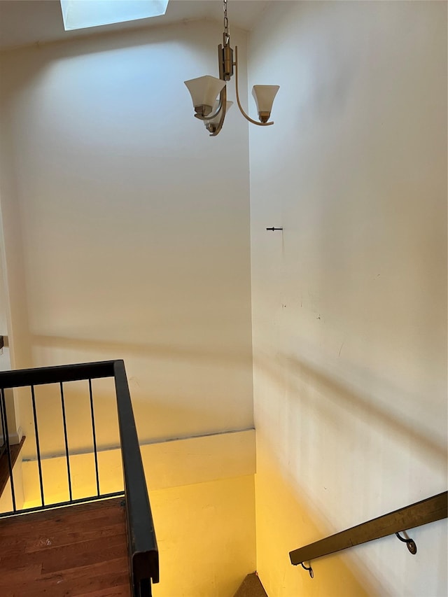411 121st St Unit 12A, College Point, NY 11356 - stairway with wood finished floors and a skylight