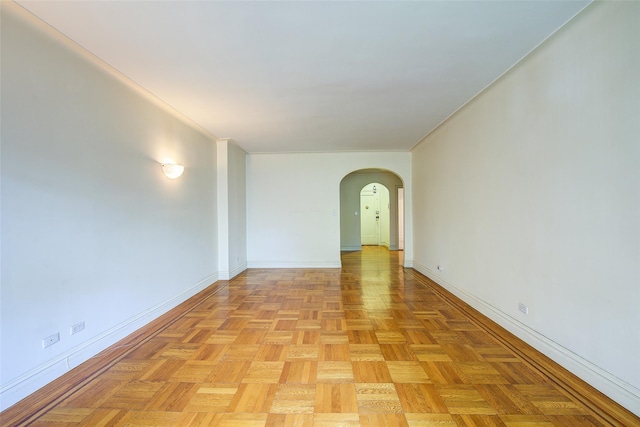 117-01 Park Ln S Unit C5D, Kew Gardens, NY 11415 - spare room with arched walkways and baseboards