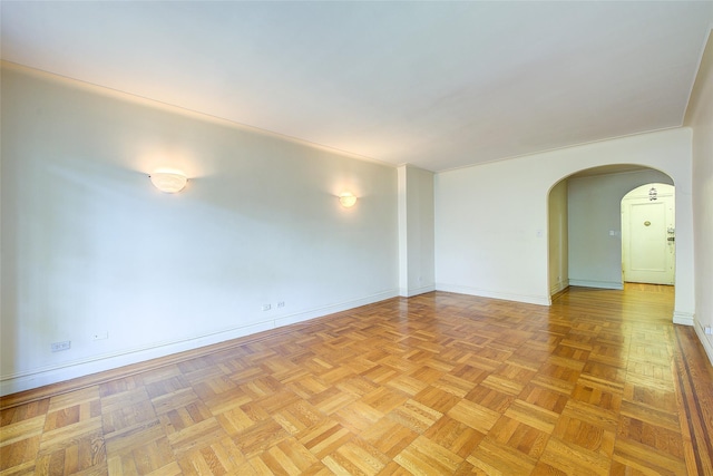 117-01 Park Ln S Unit C5D, Kew Gardens, NY 11415 - empty room featuring arched walkways and baseboards