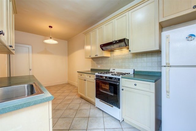 117-01 Park Ln S Unit C5D, Kew Gardens, NY 11415 - kitchen with freestanding refrigerator, gas stove, ventilation hood, backsplash, and light tile patterned floors