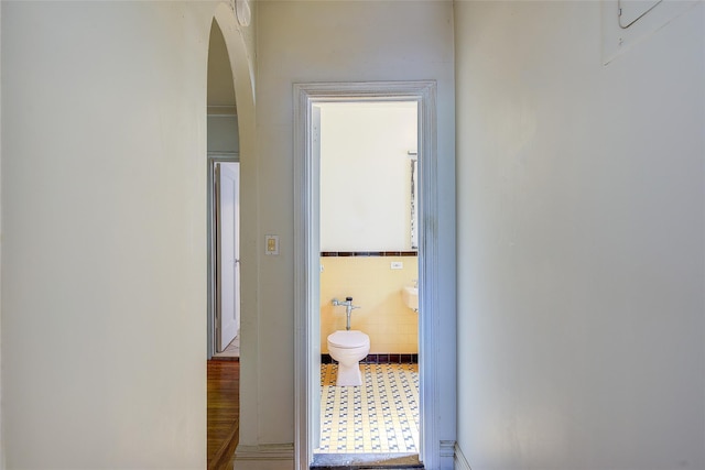 117-01 Park Ln S Unit C5D, Kew Gardens, NY 11415 - corridor featuring arched walkways and tile walls