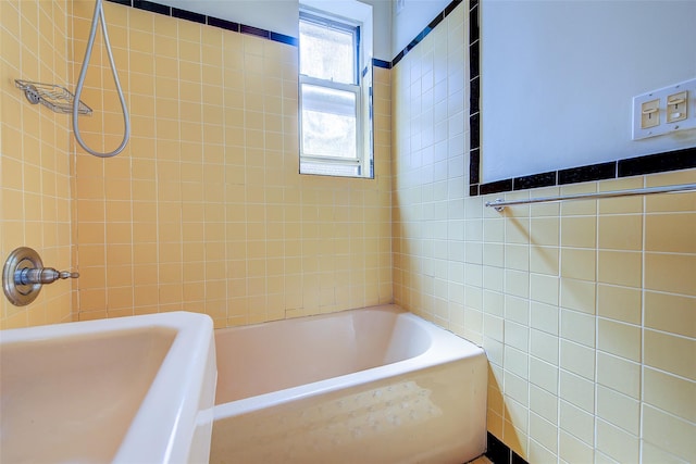 117-01 Park Ln S Unit C5D, Kew Gardens, NY 11415 - full bath with tile walls, a tub, and a shower