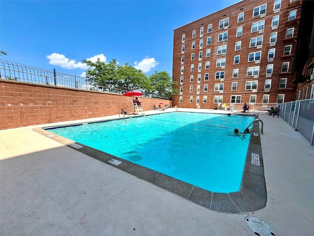 46-01 39th Ave Unit 106, Woodside, NY 11104 - community pool with a patio area
