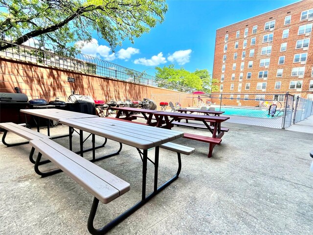 46-01 39th Ave Unit 106, Woodside, NY 11104 - surrounding community with outdoor dining area